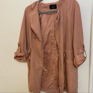 Light pink jacket. Size: medium.